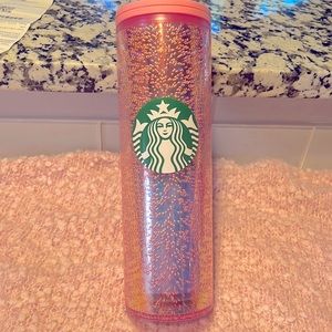 Pink Starbucks coffee tumbler to go